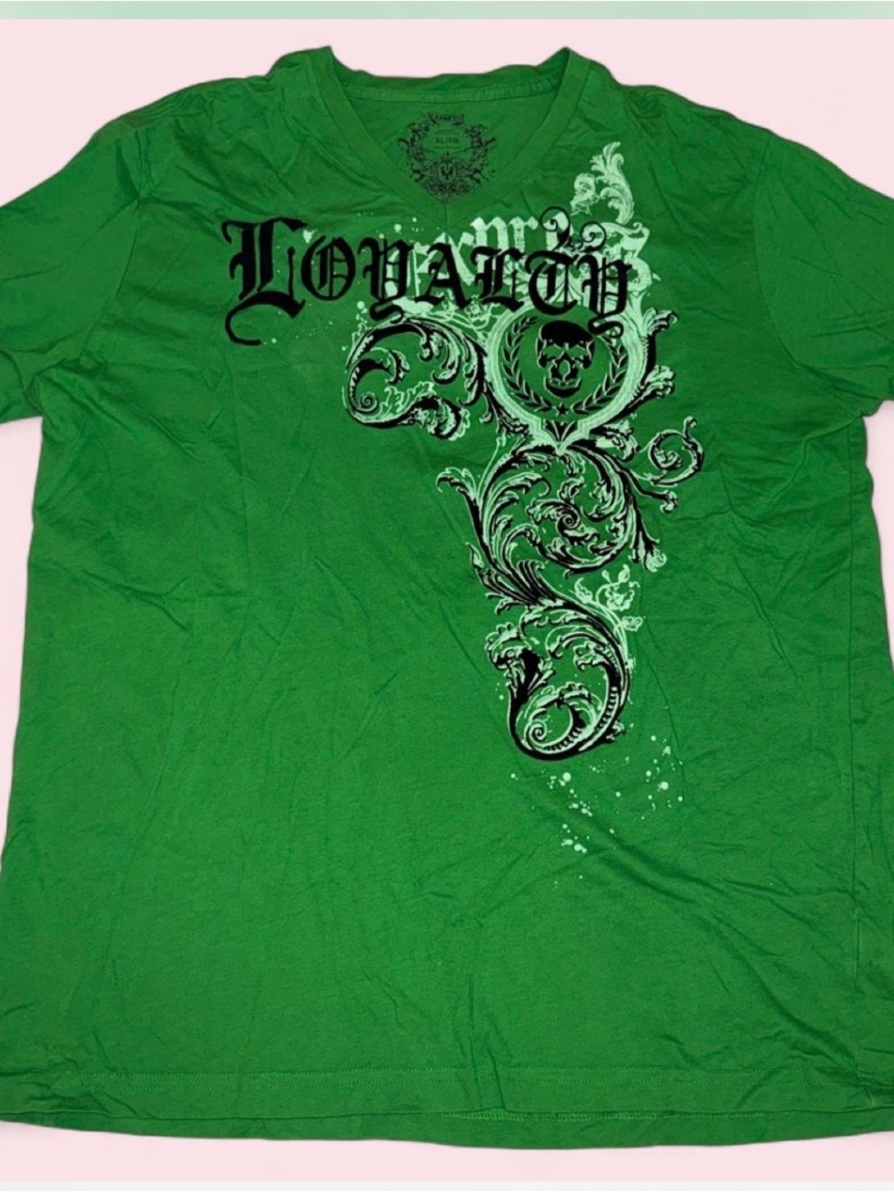 Express "Loyalty" Skull Graphic V-Neck Tee is from the mid-to-late 2000s